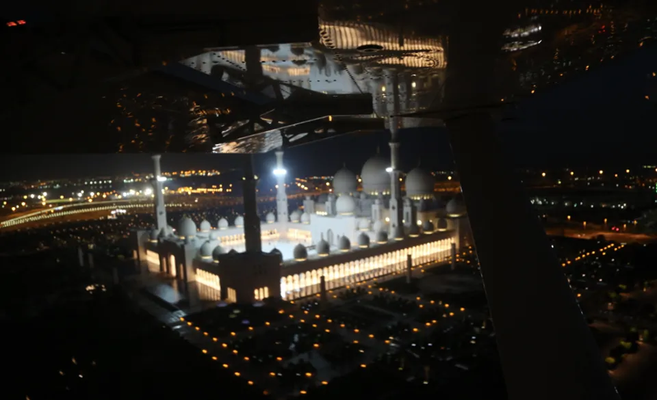 Grand mosque of Abu Dhabi illuminated at night